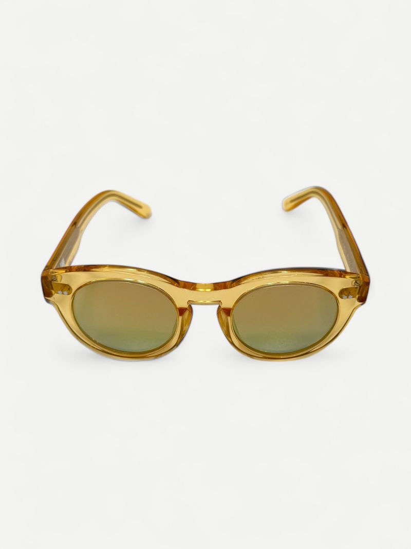 Genomskinliga solglasögon med runda bågar