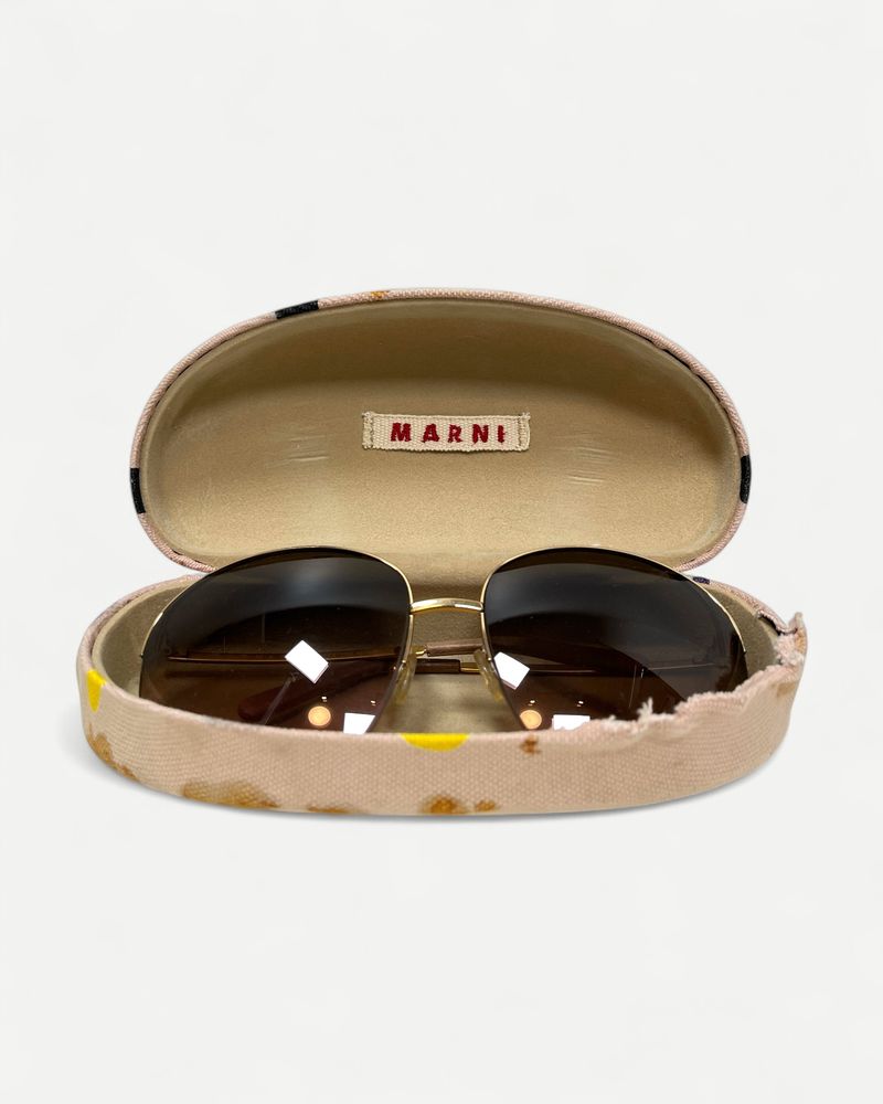 Guldfärgade pilotsolglasögon