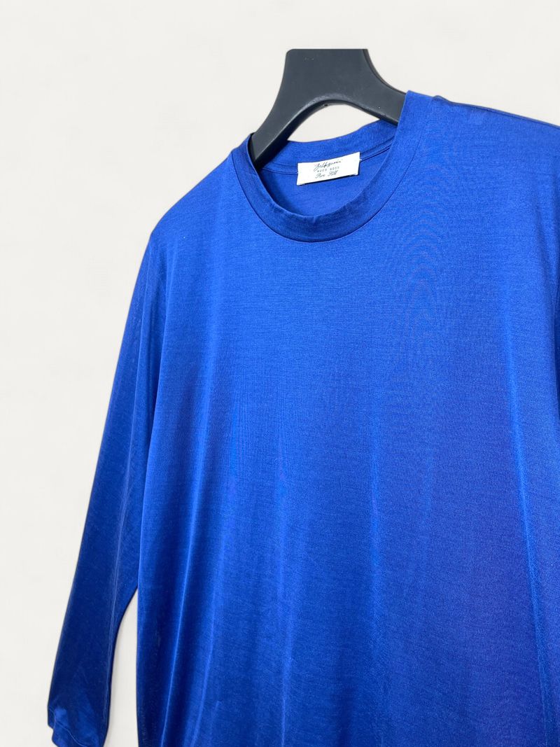 Blå stickade tröjor