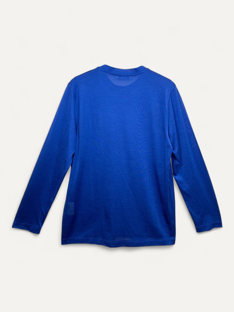 Blå stickade tröjor