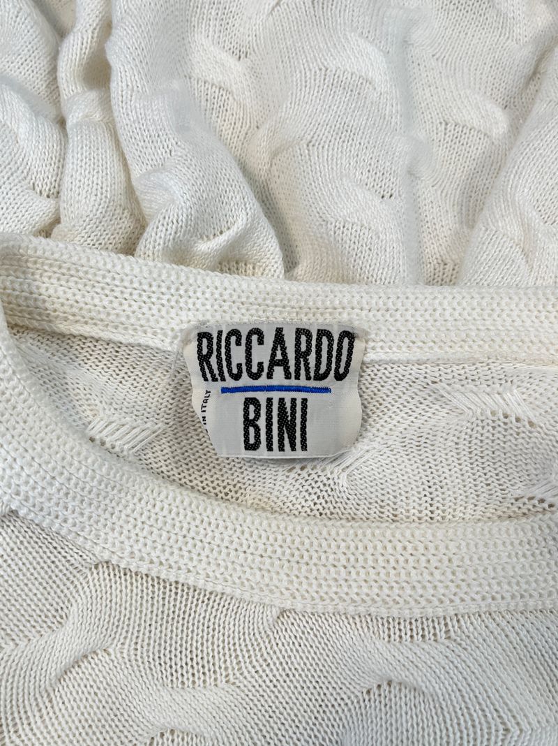 Vita stickade tröjor