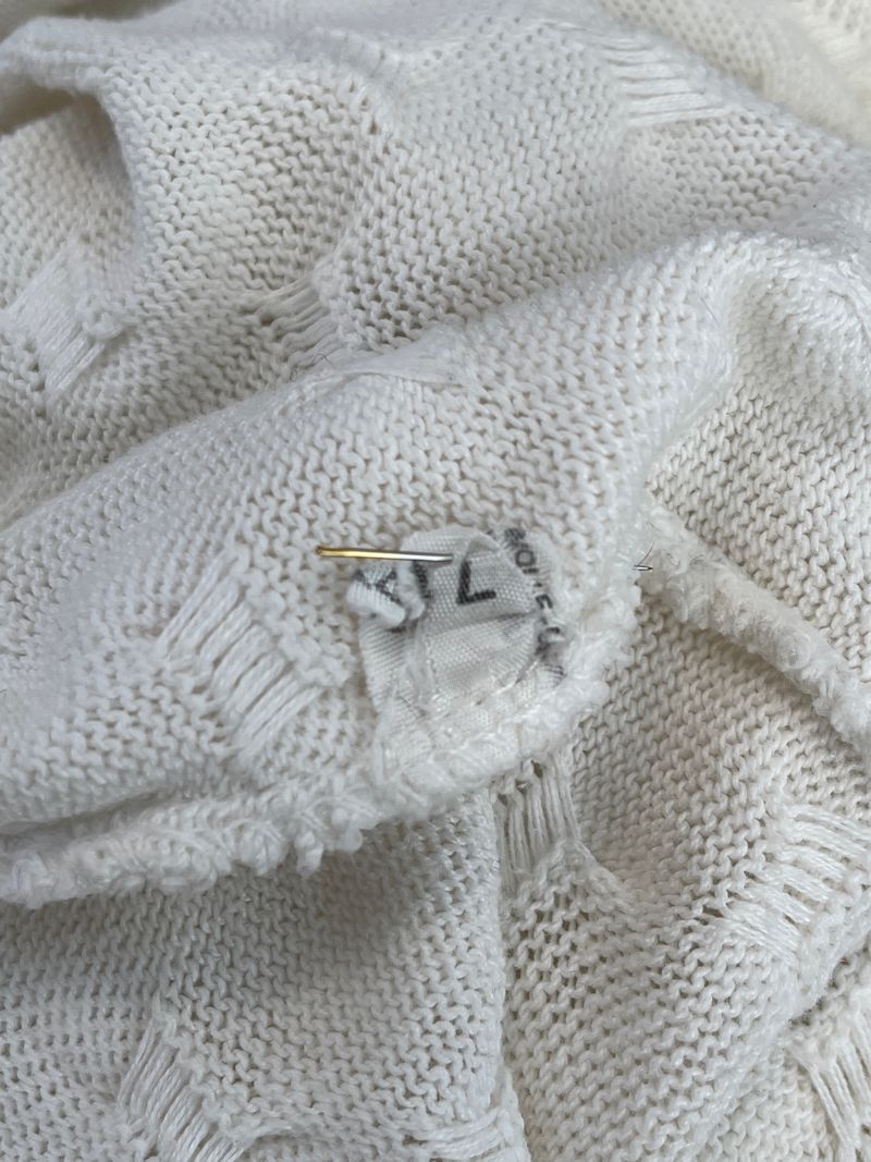 Vita stickade tröjor