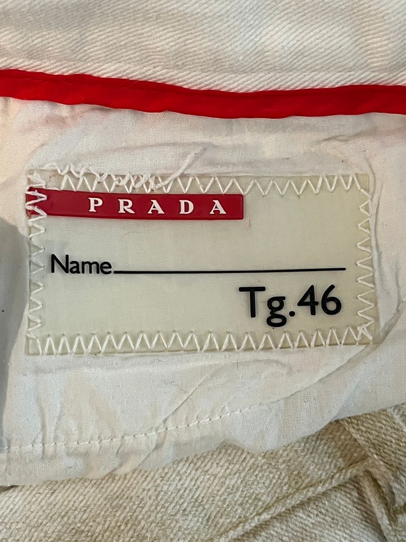 Krämfärgade utsvängda byxor